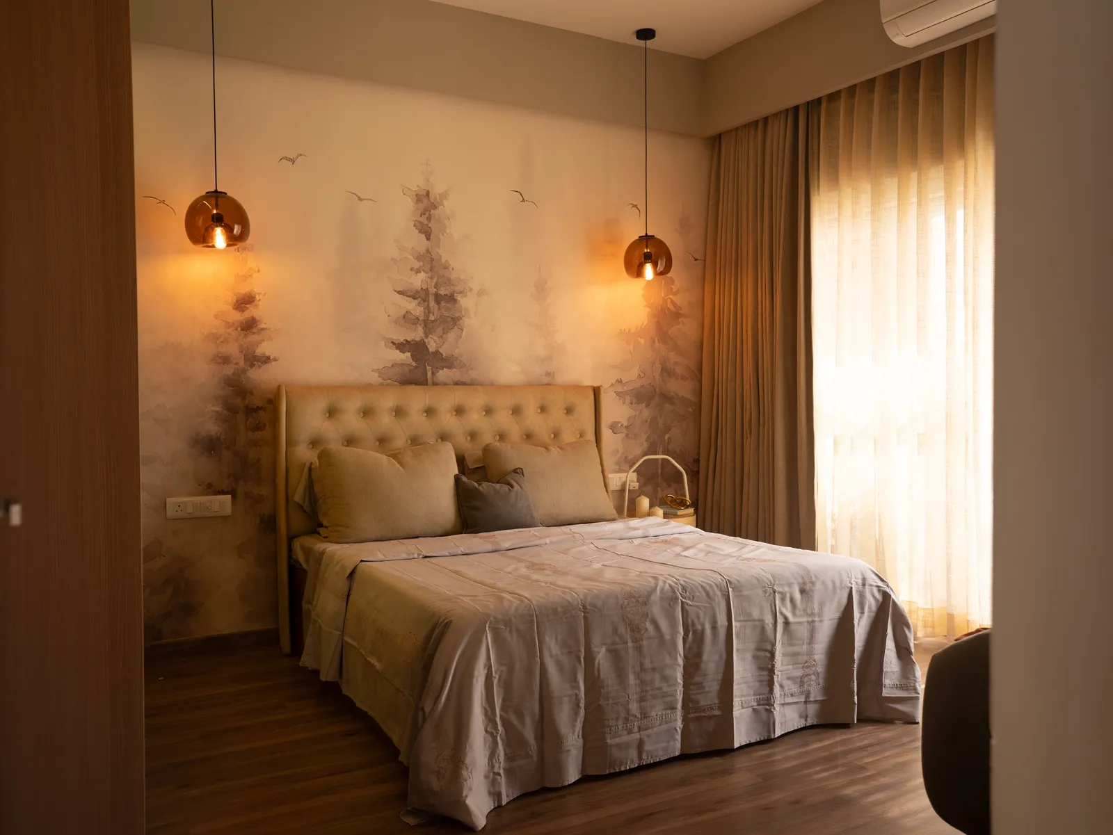 Master bedroom with misty forest mural and tufted headboard — Amlan's Residence